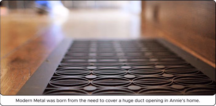 Decorative metal vent cover with wavy horizontal line pattern designed by Modern Metal to cover an entryway duct opening
