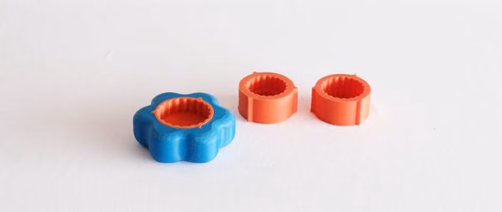 3D printed prototypes of ergonomic gripping tools in different sizes and colors
